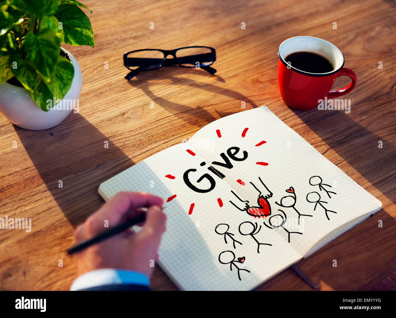 Man Writing and Planning Giving Concepts Stock Photo - Alamy
