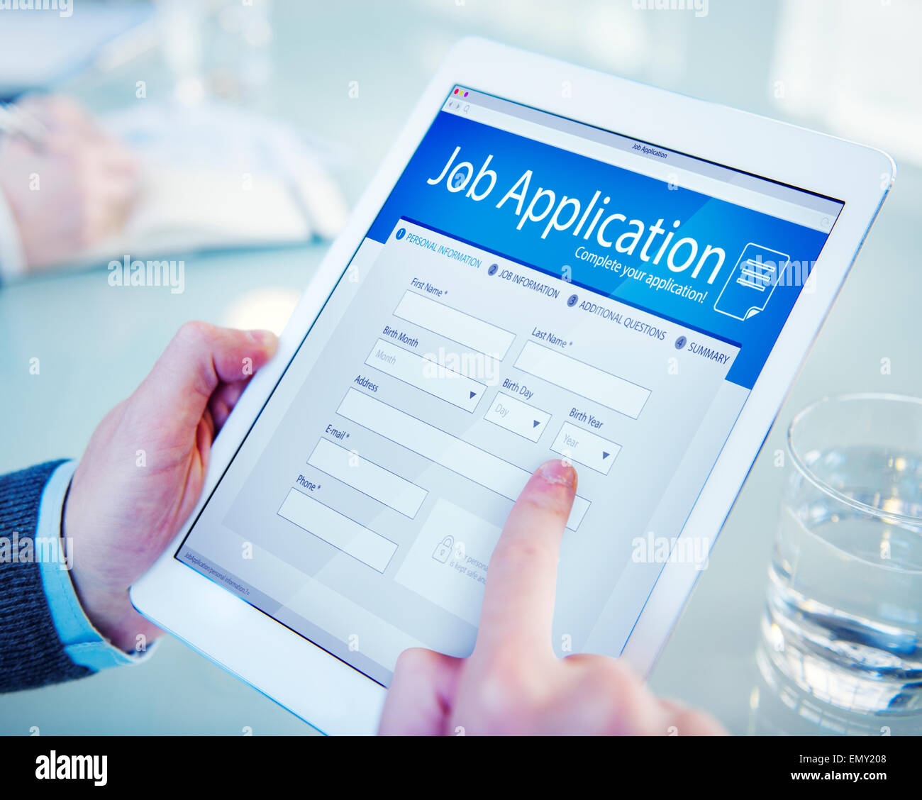 Applicant Filling Up the Online Job Application Stock Photo