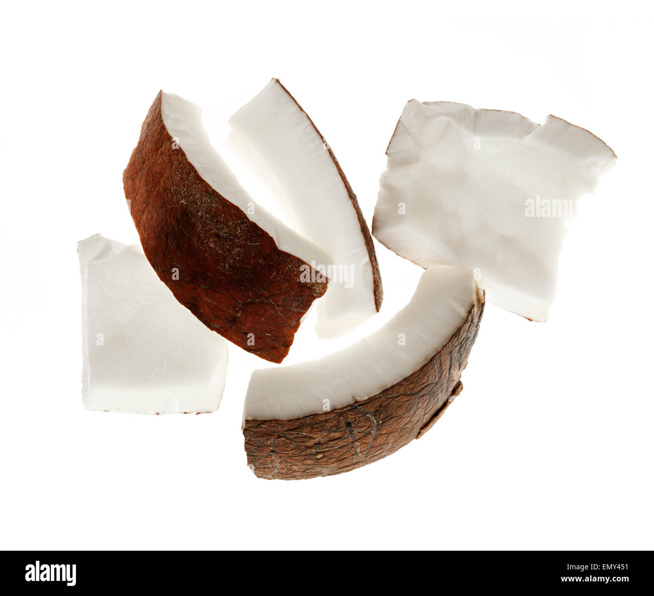Several coconut kernel chunks isolated on white background Stock Photo