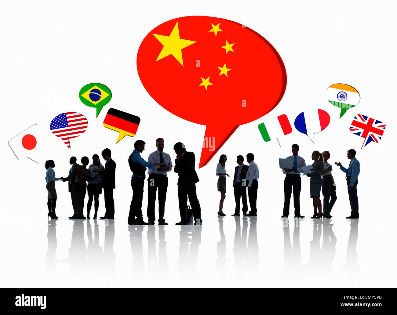 Silhouettes Of Business People Having A Discussion With Each Other And Speech Bubbles With Different National Flags Above Them. Stock Photo