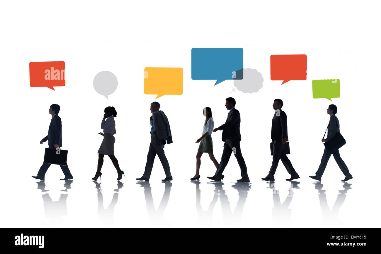 Multiethnic Business People Walking in a Row with Speech Bubble Stock Photo