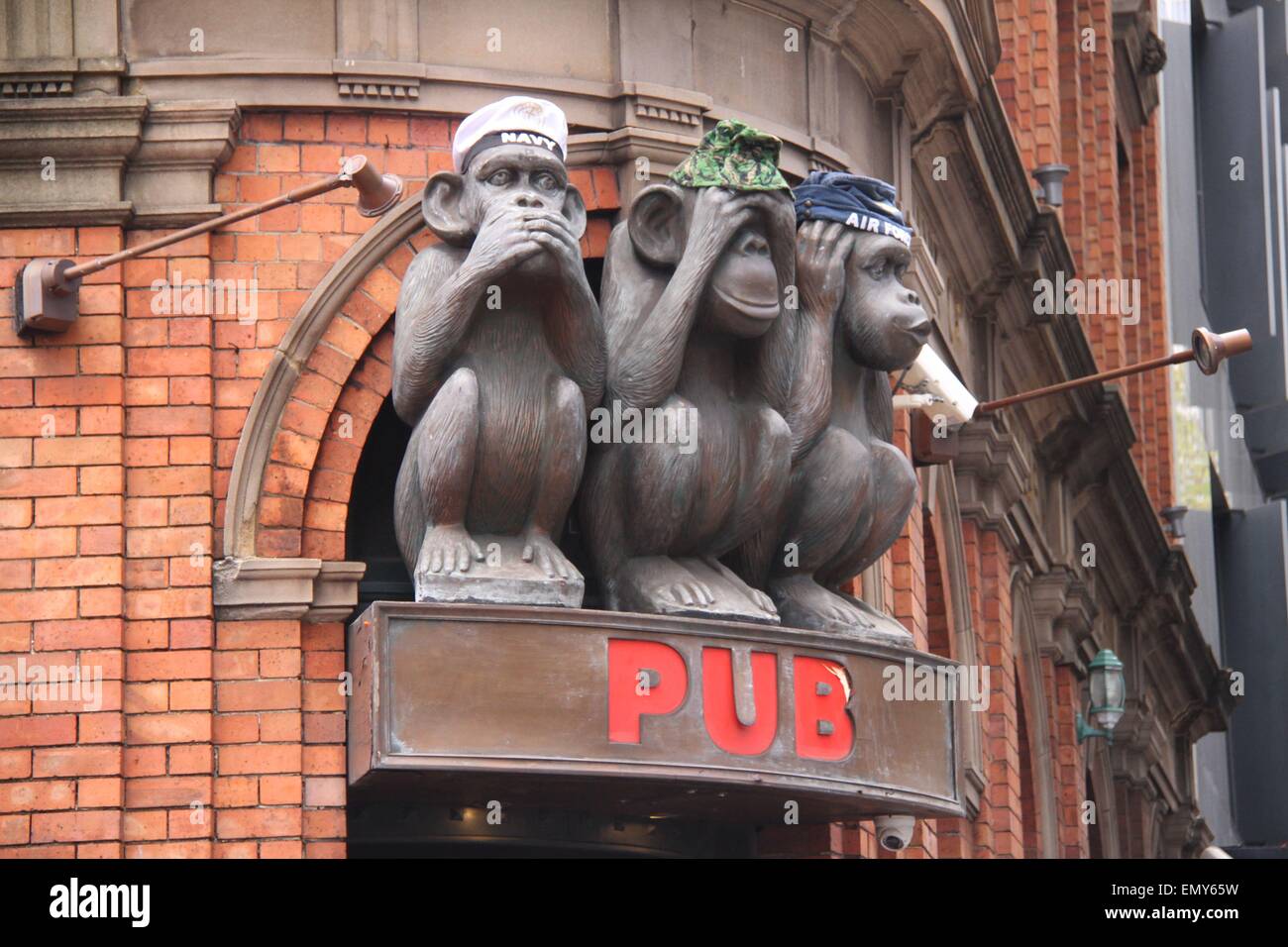 Sydney, Australia. 24 April 2015. The three monkeys wear hats representing the navy, army and air force at the 3 Wise Monkeys pub at 555 George St, Sydney ahead of ANZAC Day. Credit: Richard Milnes/Alamy Live News Stock Photo
