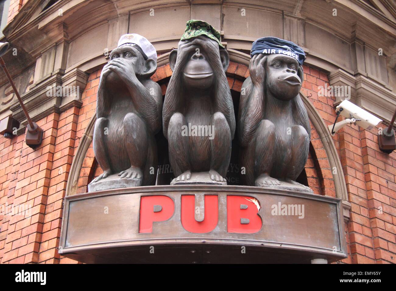 Sydney, Australia. 24 April 2015. The three monkeys wear hats representing the navy, army and air force at the 3 Wise Monkeys pub at 555 George St, Sydney ahead of ANZAC Day. Credit: Richard Milnes/Alamy Live News Stock Photo