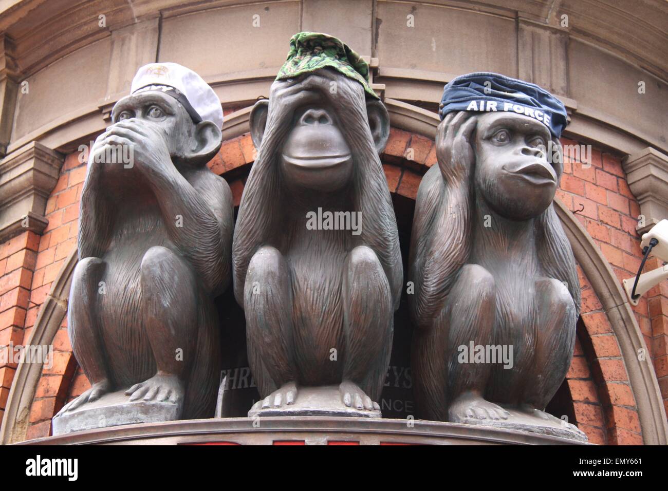 Sydney, Australia. 24 April 2015. The three monkeys wear hats representing the navy, army and air force at the 3 Wise Monkeys pub at 555 George St, Sydney ahead of ANZAC Day. Credit: Richard Milnes/Alamy Live News Stock Photo