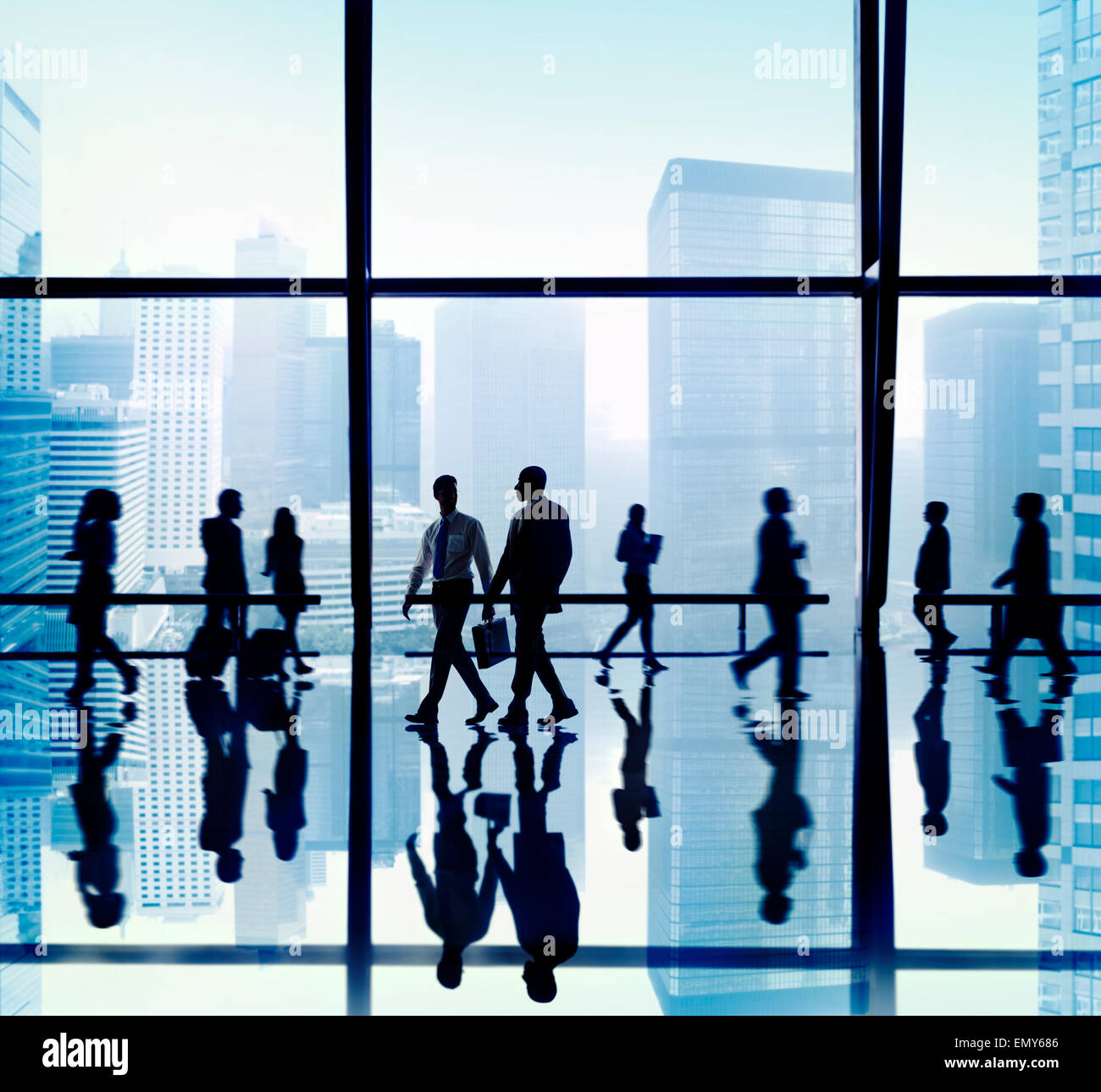 Group of businessmen walking hi-res stock photography and images - Alamy