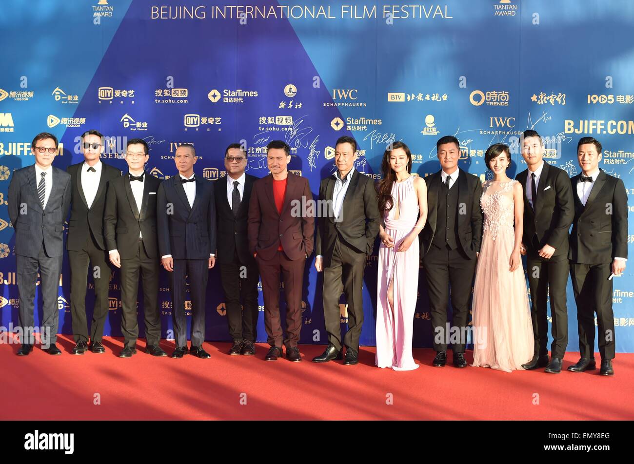 Beijing, China. 23rd April, 2015. Cast members of the movie ''Helios'' directors Lok Man Leung(5L) and Lu Jianqing(1L), actors Chang Chen(2L), Nick Cheung(4L), Jacky Cheung(6L), Wang Xueqi(7L), Shawn Yue(4R) and South Korean actor and singer Choi Siwon pose for photos during the closing ceremony of the 5th Beijing International Film Festival. Credit:  SIPA Asia/ZUMA Wire/Alamy Live News Stock Photo