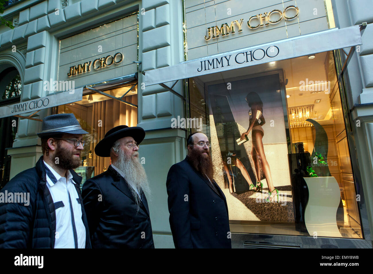 Prague shopping street Orthodox Jews in front of Jimmy Choo fashion store, Parizska street Prague, Old Town, Czech Republic Jews travel Stock Photo