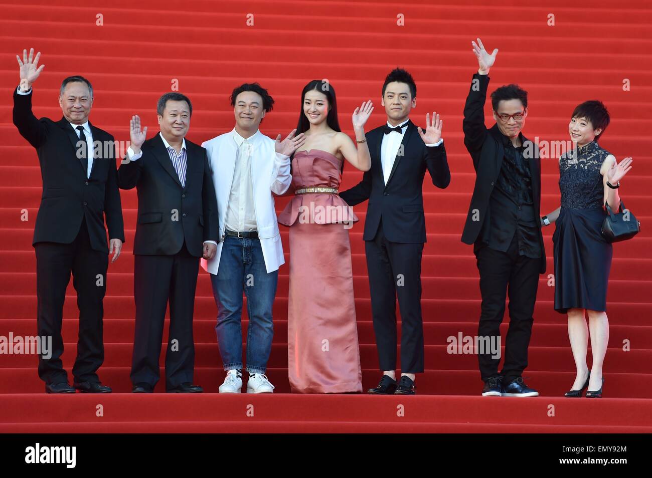Beijing, China. 23rd April, 2015. Cast members of the movie 'Gorgeous office workers'' walk the red carpet during the closing ceremony of the 5th Beijing International Film Festival. Director Johnny To(1L), actor Eason Chan(3L), actress Lang Yueting(4L), actor Wang Ziyi(3R), singer Tayu Lo Credit:  SIPA Asia/ZUMA Wire/Alamy Live News Stock Photo