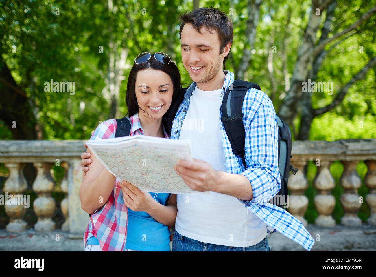 Young travelers learning guide during journey Stock Photo Alamy
