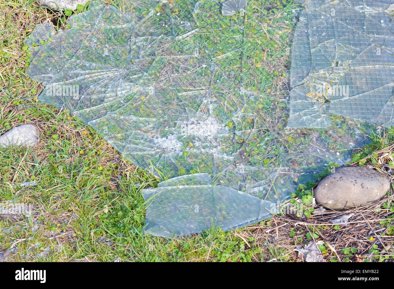 Small pieces of a broken glass on the footpath Stock Photo Alamy