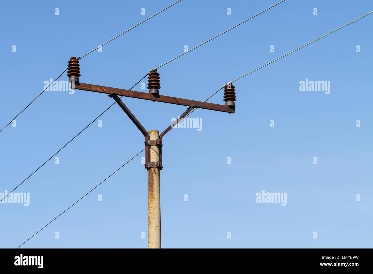 Powerlines against a background of the sky Stock Photo