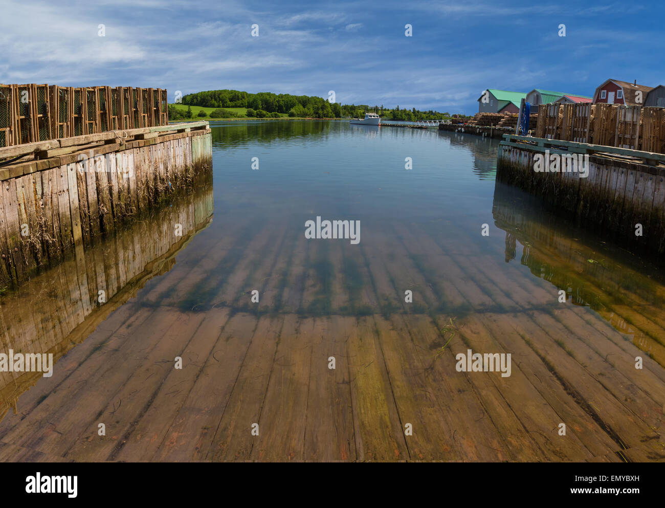A boat slip at a commercial lobster fishing wharf in rural Prince Edward Island, Canada. Stock Photo