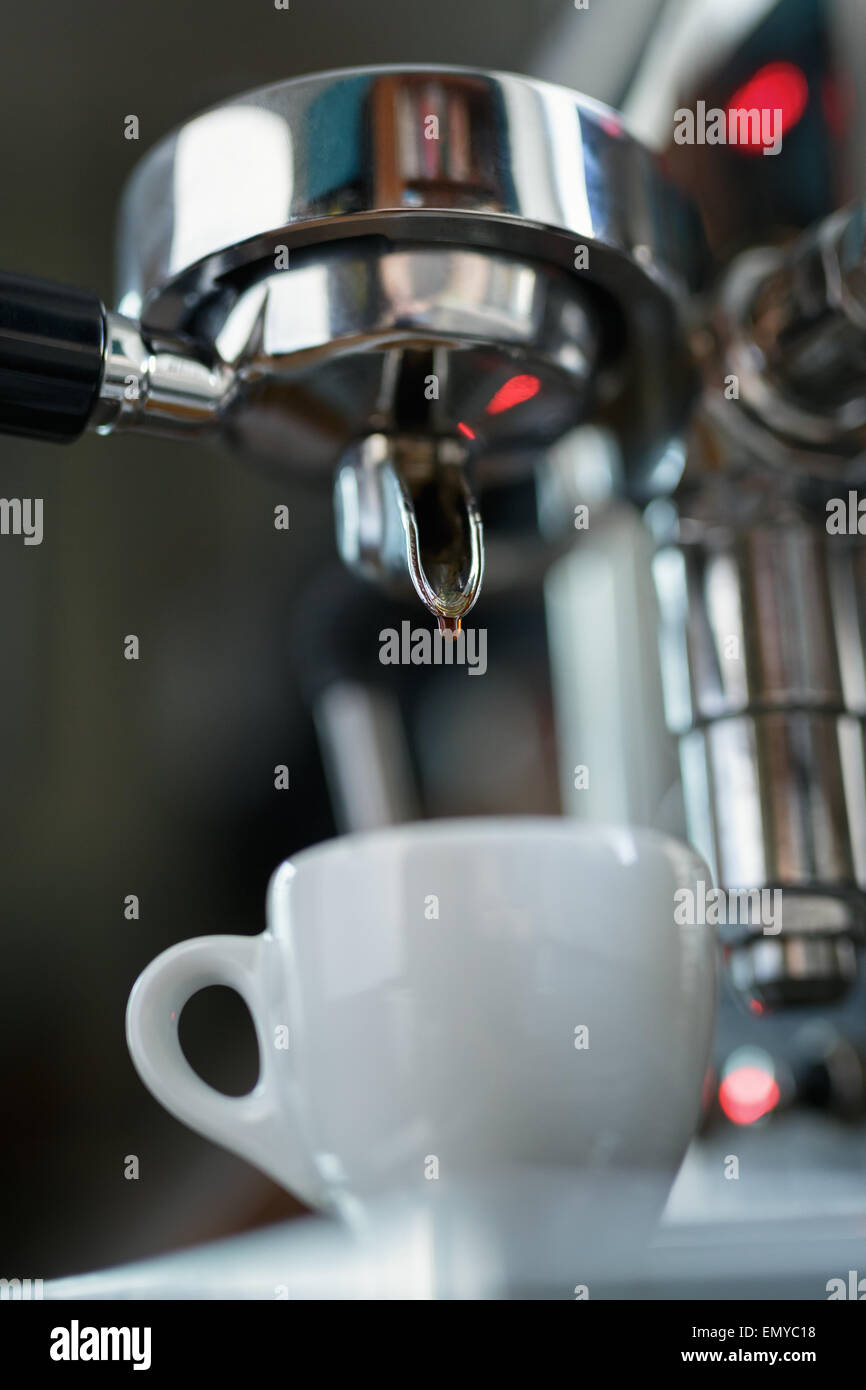 preparing espresso on professional coffee machine Stock Photo Alamy