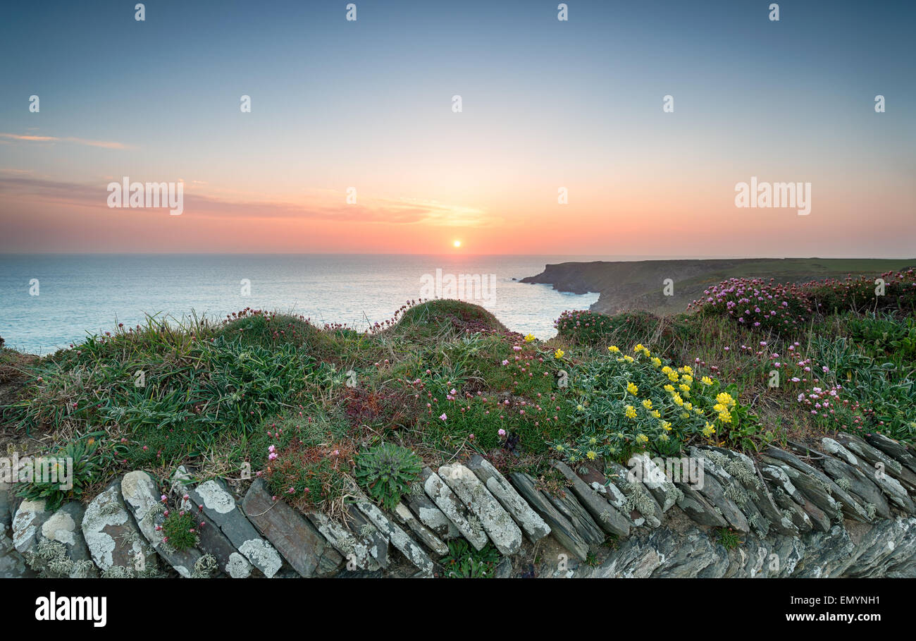 Sunset from the South West Coast Path at Park Head near Porthcothan on the north Cornwall coast Stock Photo