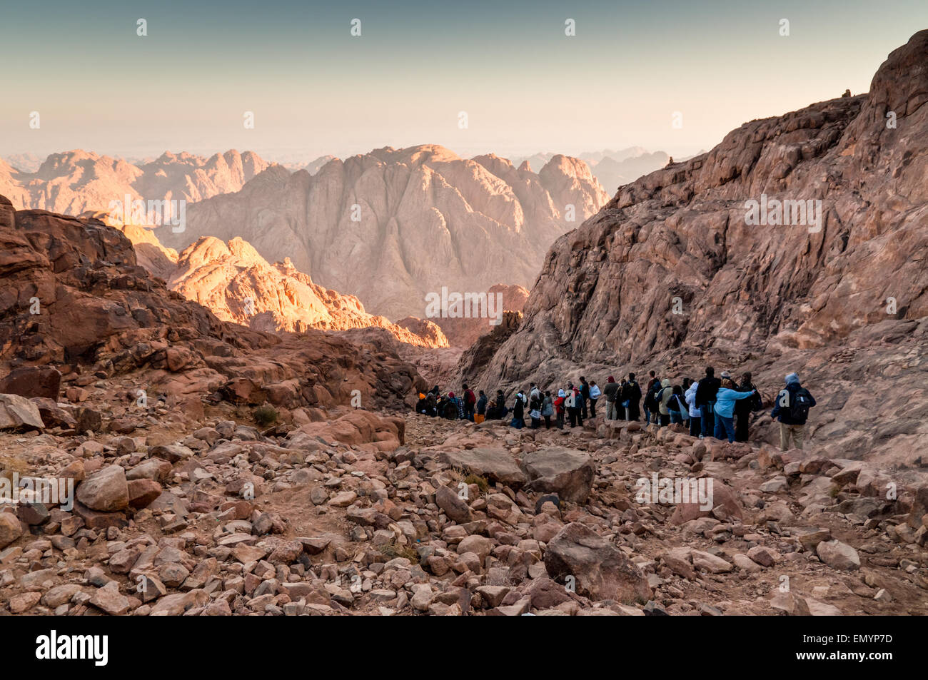 Pilgrims and tourists on the pathway from the Mount Sinai peak and panorama rocks of Mount Sinai Stock Photo