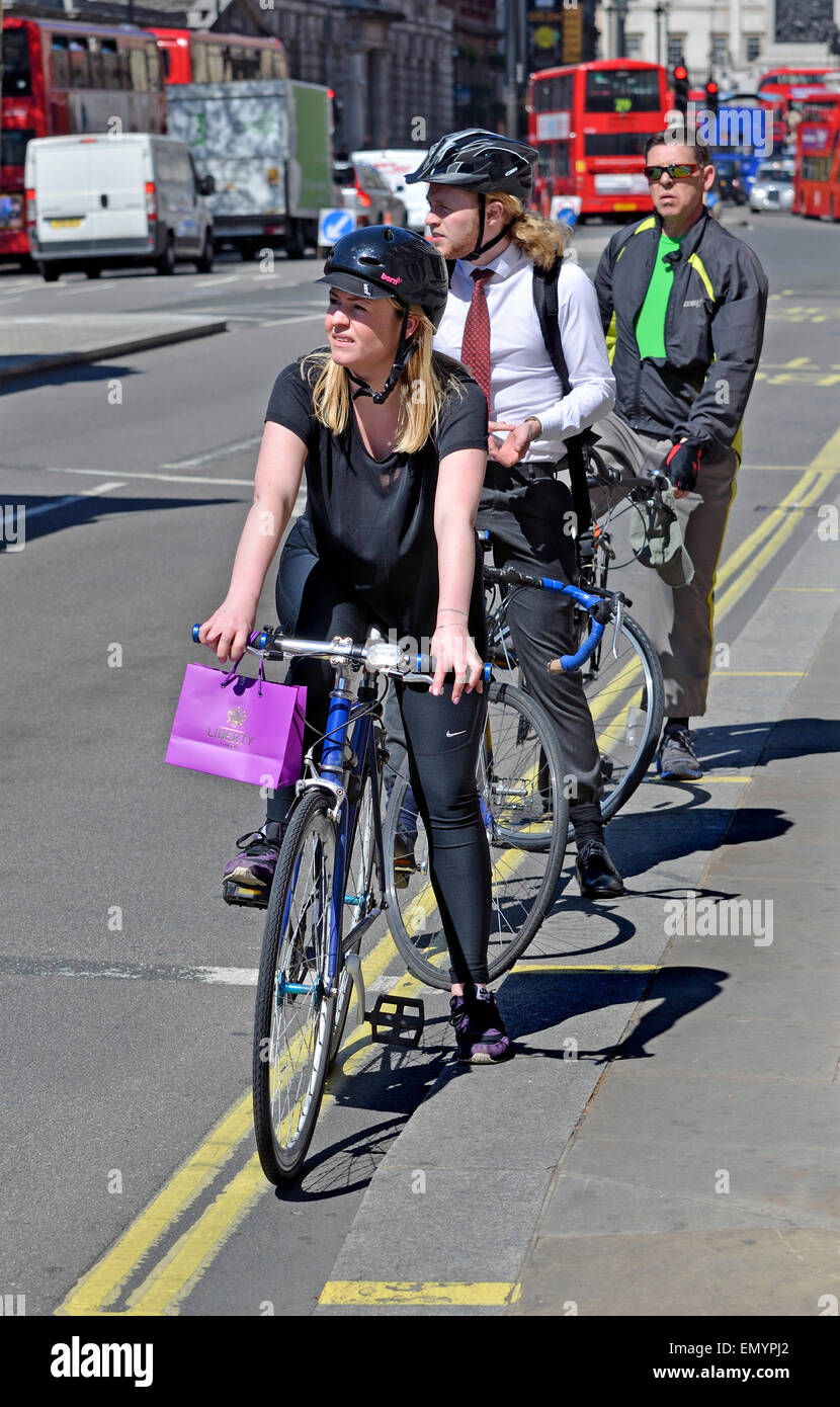 London, England, UK. Three cyclists in Whitehall Stock Photo