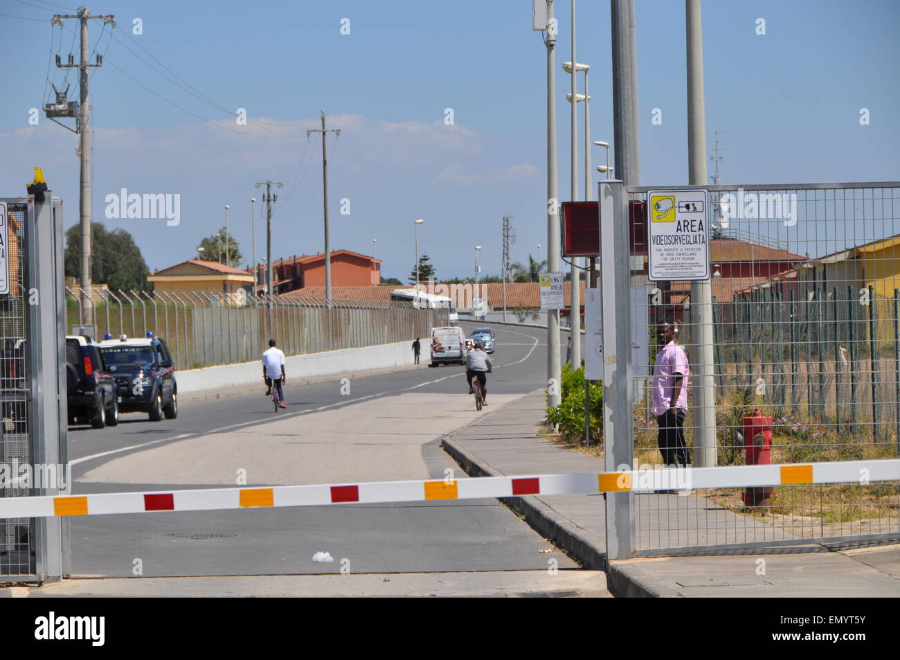 The Mineo holding center, Sicily, Italy, Tuesday, April 22, 2015. Although the migrants can come and go as they wish, without proper documents it is useless to try to escape. According to the Director of the center there are currently over 3200 migrants, mostly sub-Saharan Africans who are spending years here waiting for political asylum. There are also over 200 ethnic groups at the center. (CTK Photo/Tereza Supova) Stock Photo