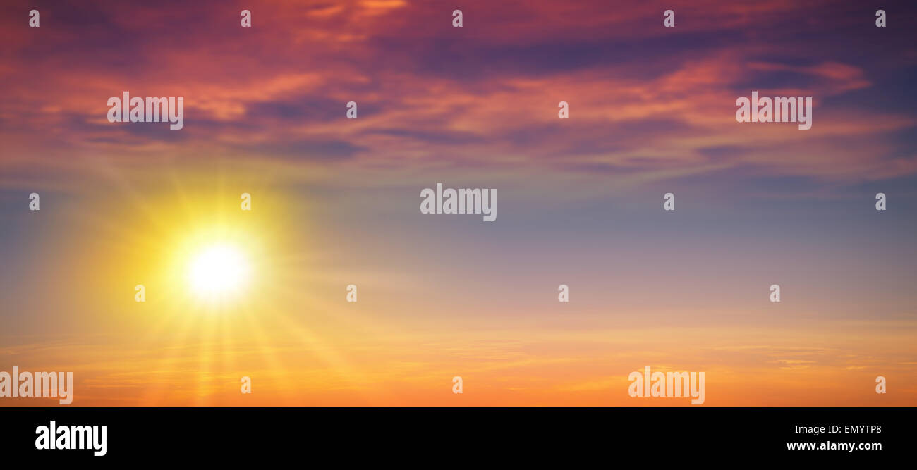 Panoramic wild sunset. High resolution summer sun background Stock Photo