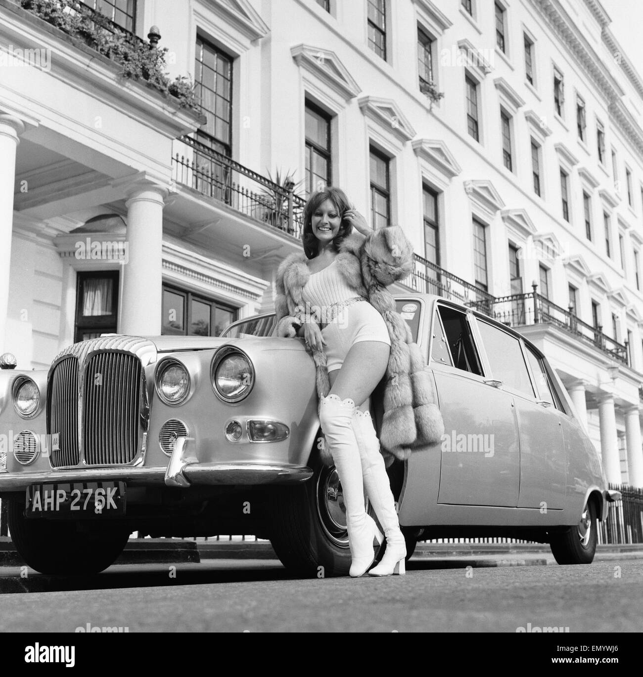 Lesley Russ photographed with her husband's car, Daimler Limousine, 'Silver Medallion' outside her London home in Hyde Park Gardens. 6th October 1972 Stock Photo