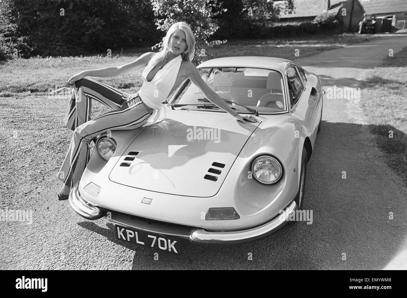 Reveille model Heidi seen here posing with a Ferrari Dino GT which is NOT A top prize in the Reveille win a car competition circa 1972 Stock Photo