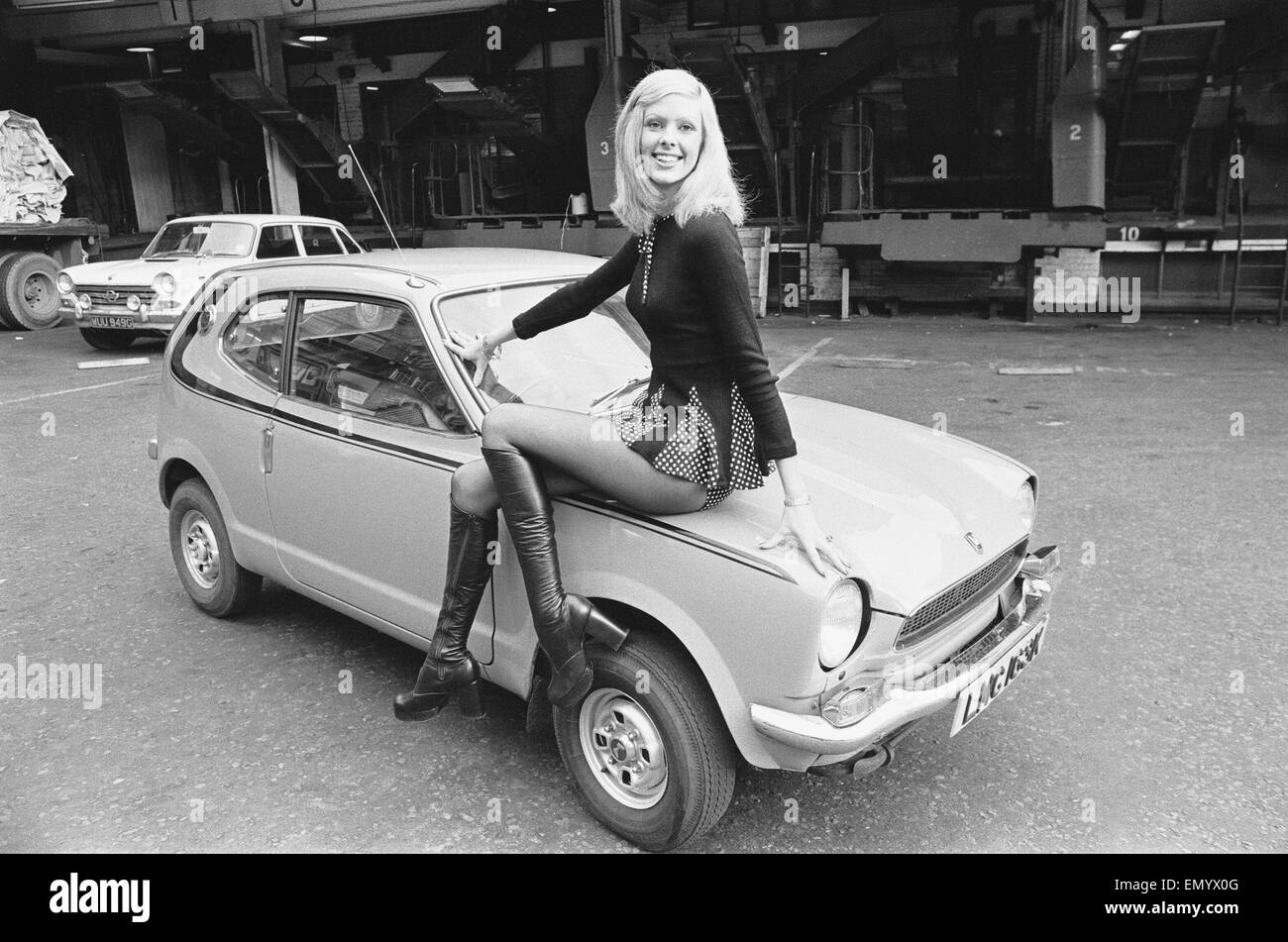 Reveille model Krista seen here posing with a Honda Civic car which is a top prize in the Reveille win a car competition circa 1972 Stock Photo