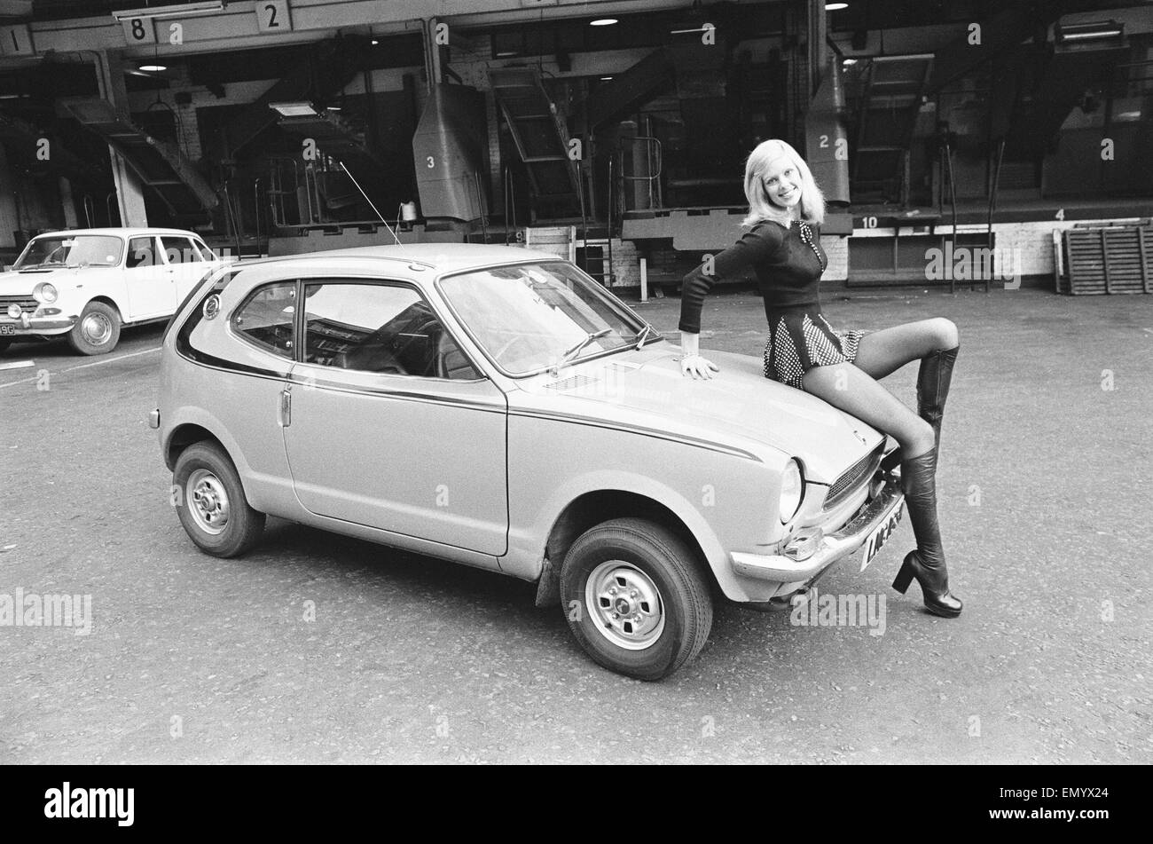 Reveille model Krista seen here posing with a Honda Civic car which is a top prize in the Reveille win a car competition circa 1972 Stock Photo