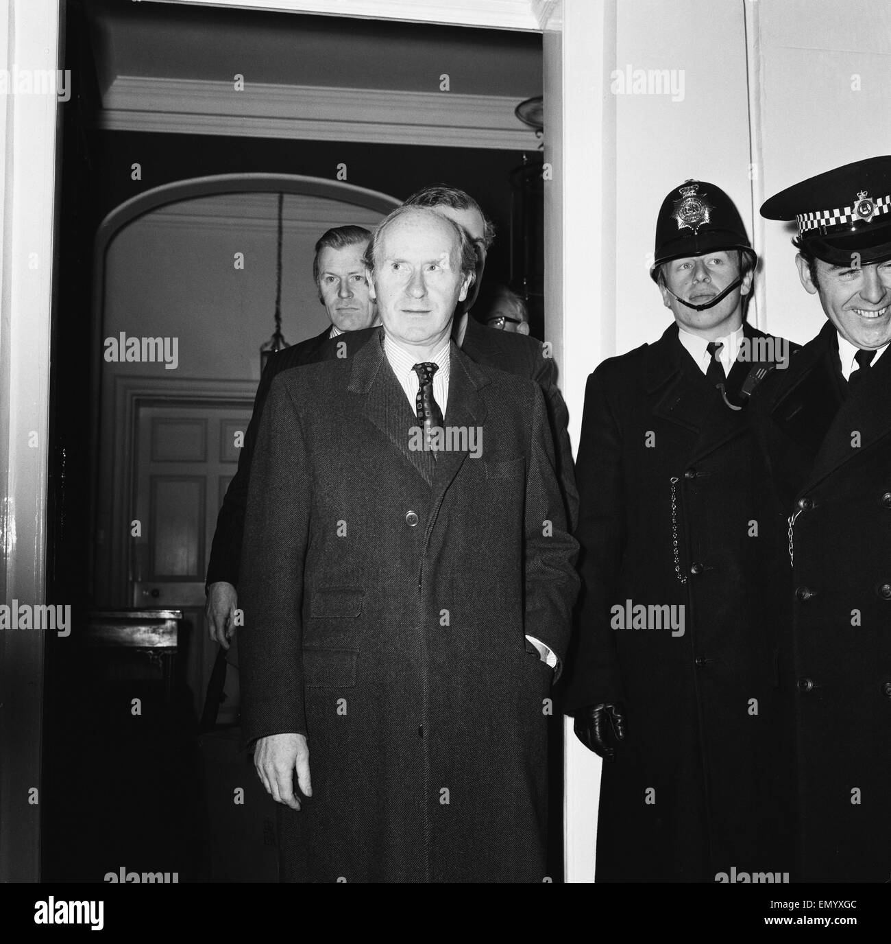 Chancellor of the Exchequer Anthony Barber dejectedly leaves number 11 Downing Street on his way to the House of Commons to deliver a 'mini budget' during the Oil Crisis. 17th December 1973. Stock Photo