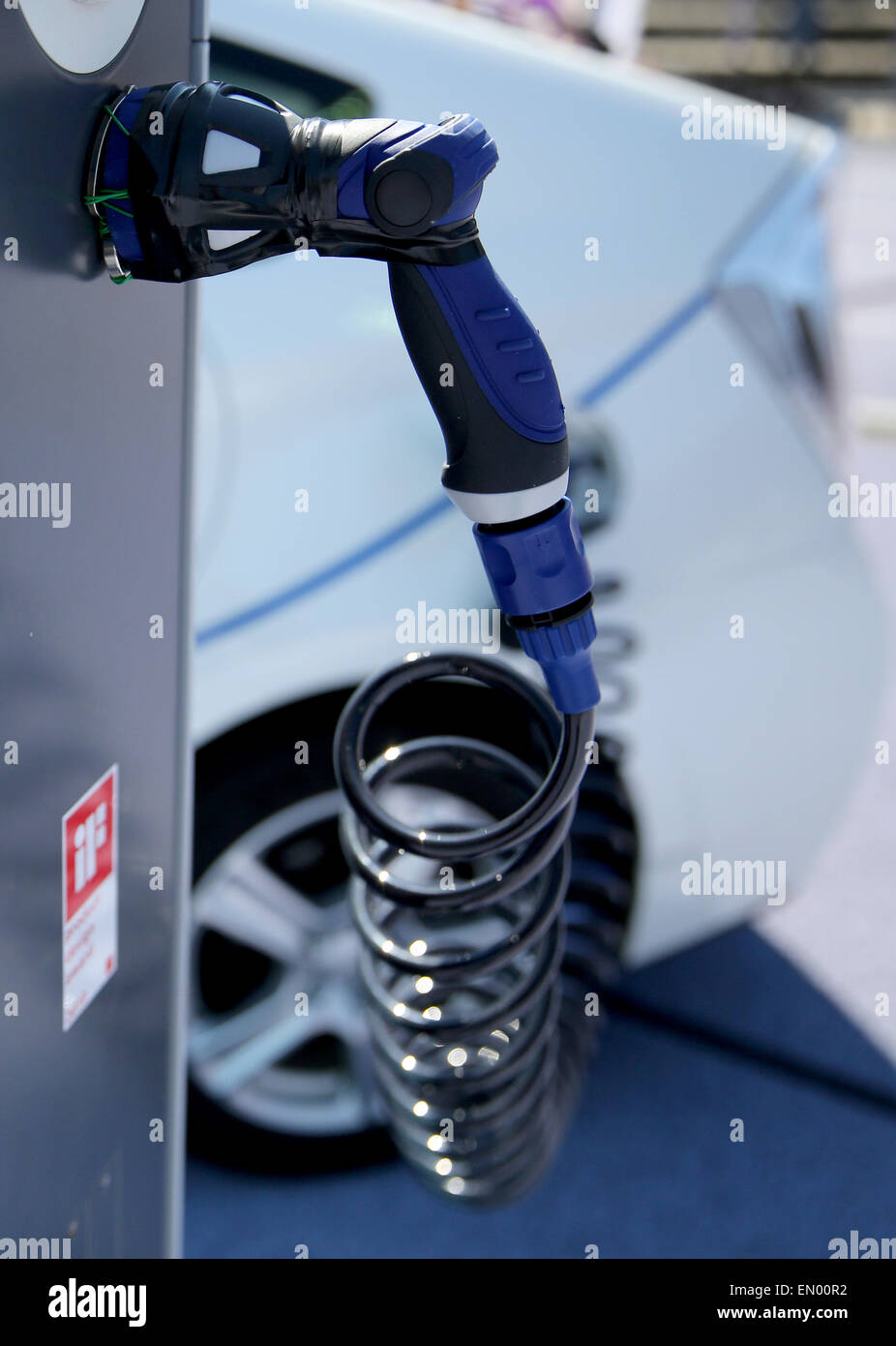 Aue, Germany. 19th Apr, 2015. A Toyota Prius charging with renewable energy at a charging station of Chemnitz energy provider EnviaM in Aue, Germany, 19 April 2015. PHOTO: JAN WOITAS/dpa/Alamy Live News Stock Photo