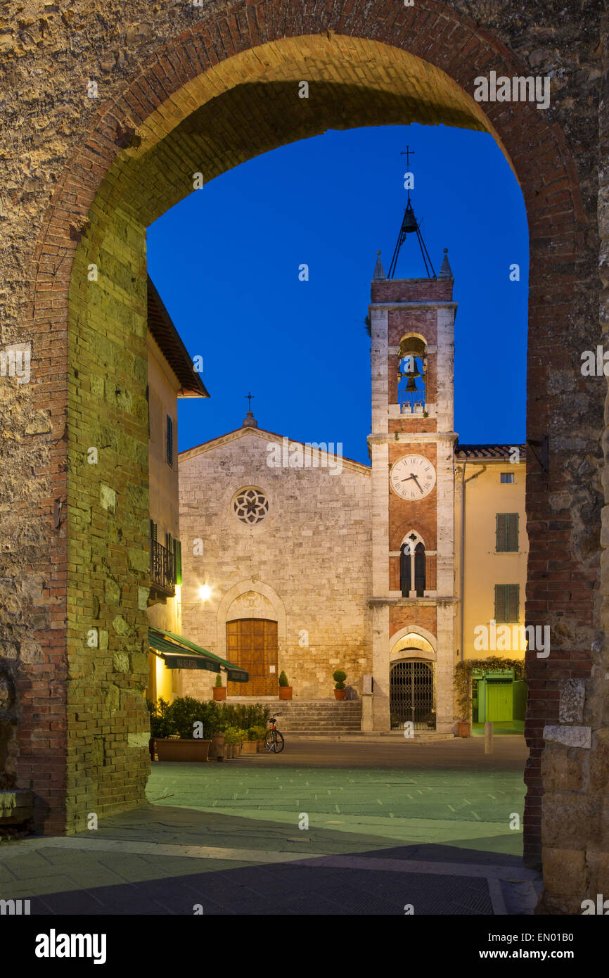 Twilight over Chiesa San Francesco, San Quirico d'Orcia, Tuscany, Italy Stock Photo