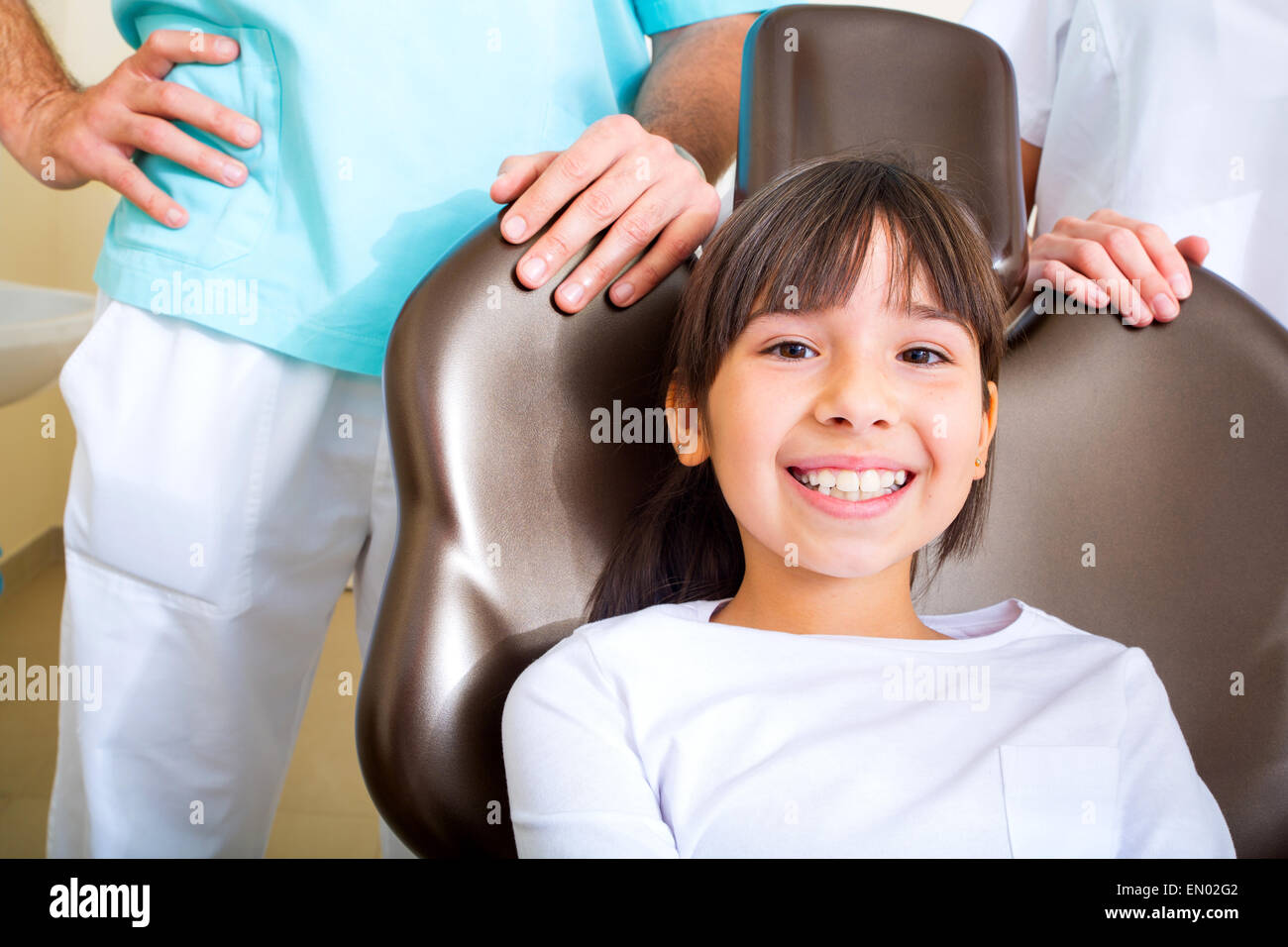 A little girl at the dentist during treatment. Stock Photo