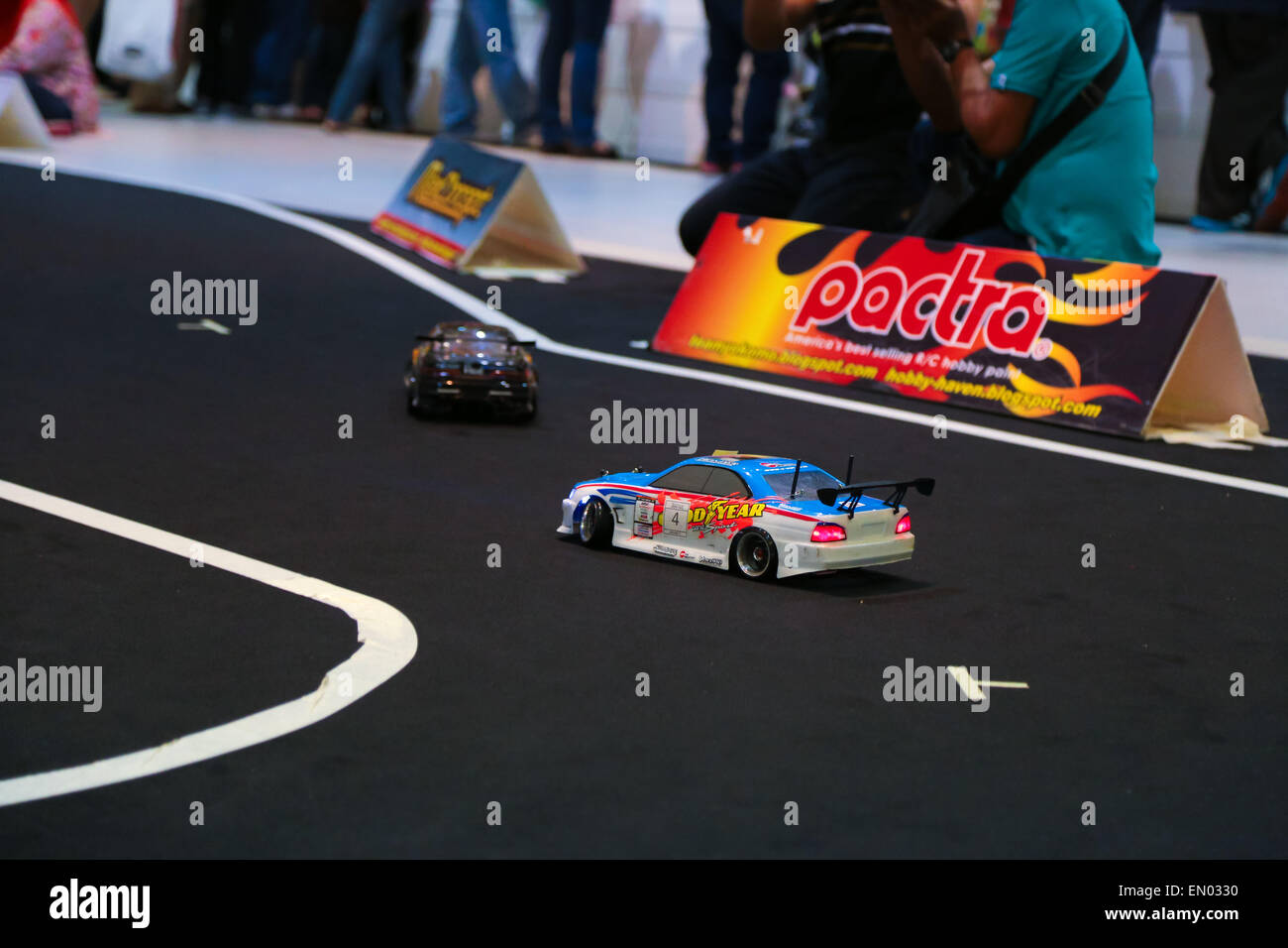 Remote controlled car race at KL International Motorshow 2013 Stock
