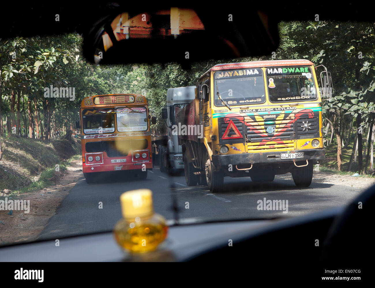 SRI LANKA: bus coming head on on the road between Colombo & Kandy Stock Photo