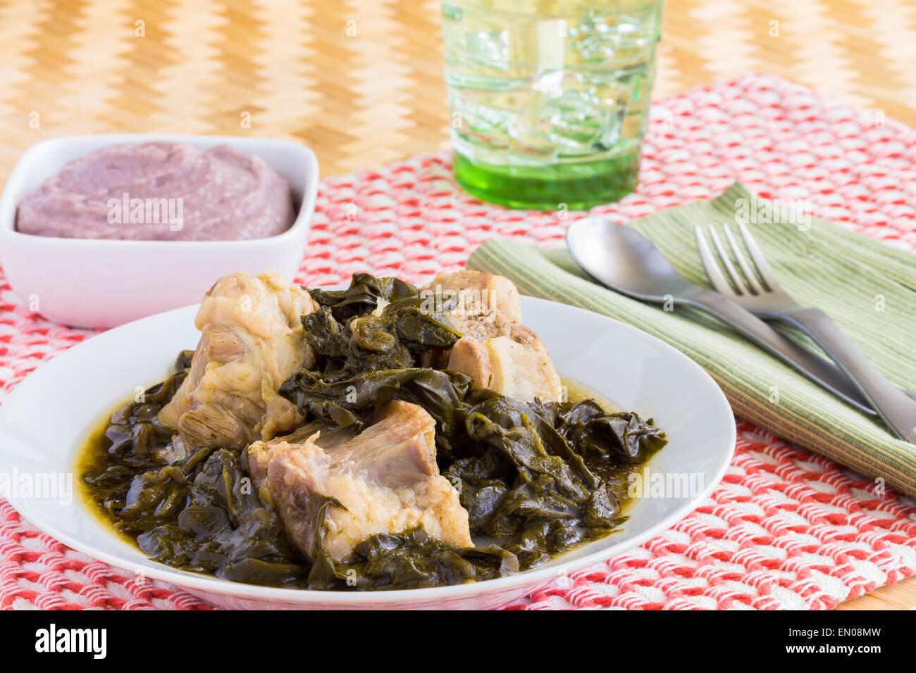 Traditional Hawaiian soup made with beef tail and steamed taro leaves