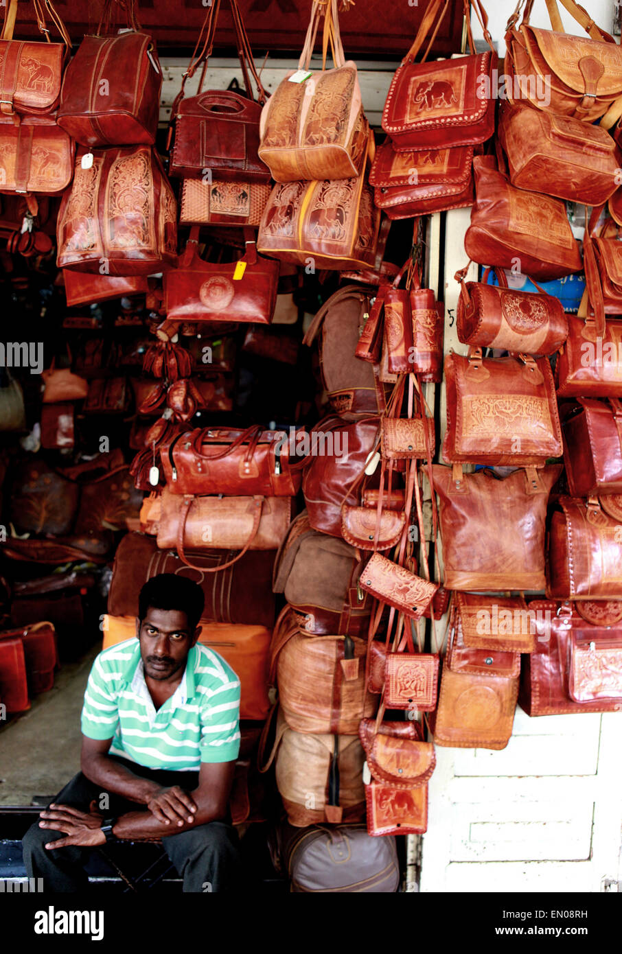 Sri Lanka: man selling leather bags in Galle Fort Stock Photo - Alamy