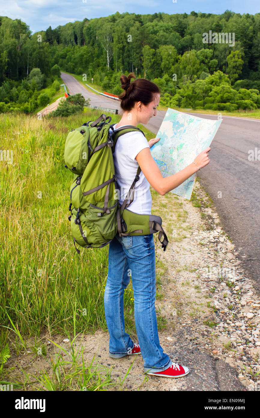 Female hiker reading map Stock Photo - Alamy
