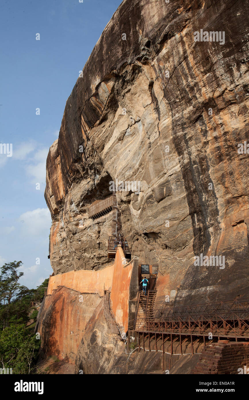 Sri Lanka: tourist climbing up to the Sigiriya temple Stock Photo