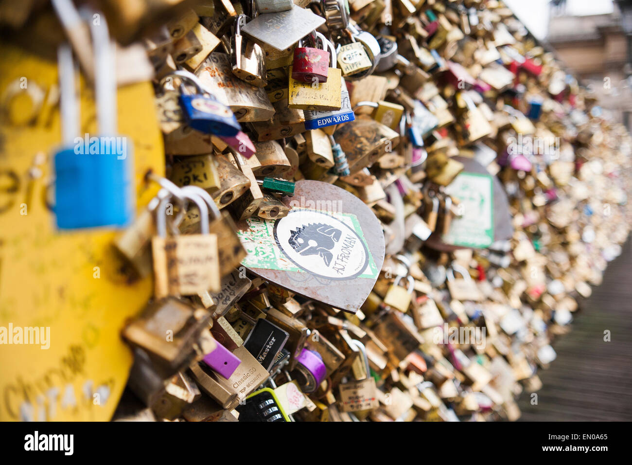 The padlocks left on the fence of a bridge over the Seine in Paris are