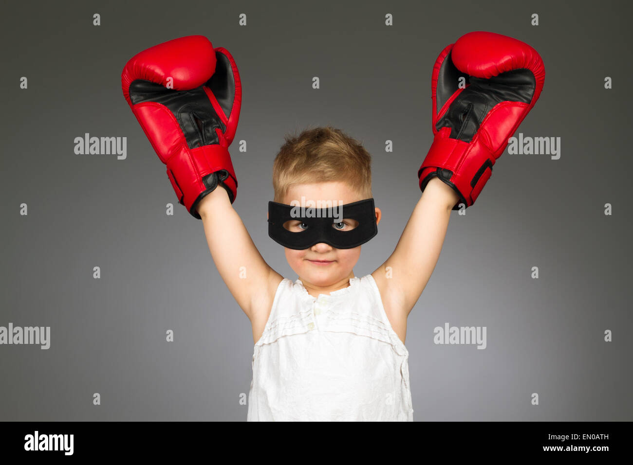 Boxing kid arms up Stock Photo Alamy
