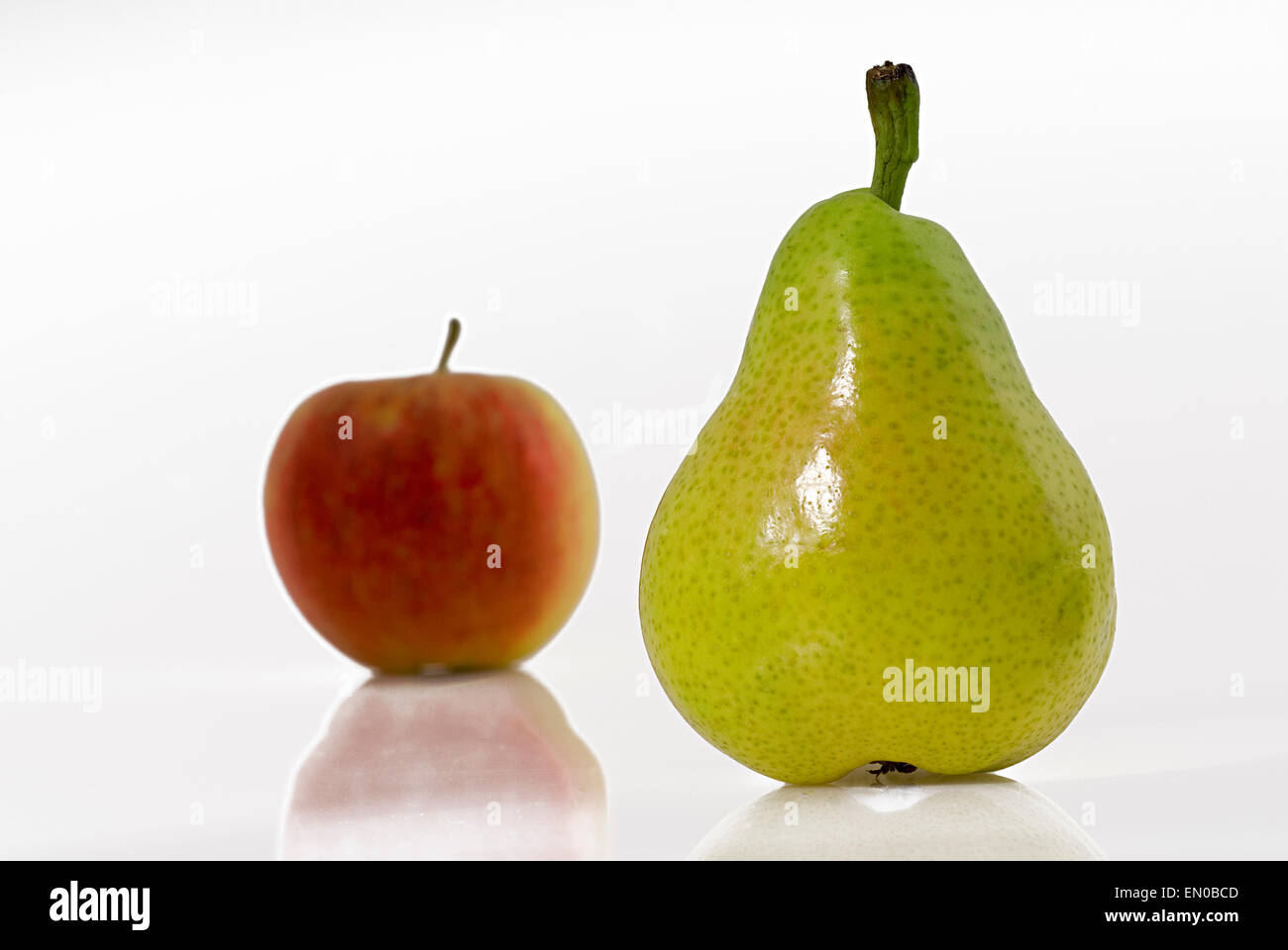Red apple and green pear food fruit fruits studio Stock Photo - Alamy