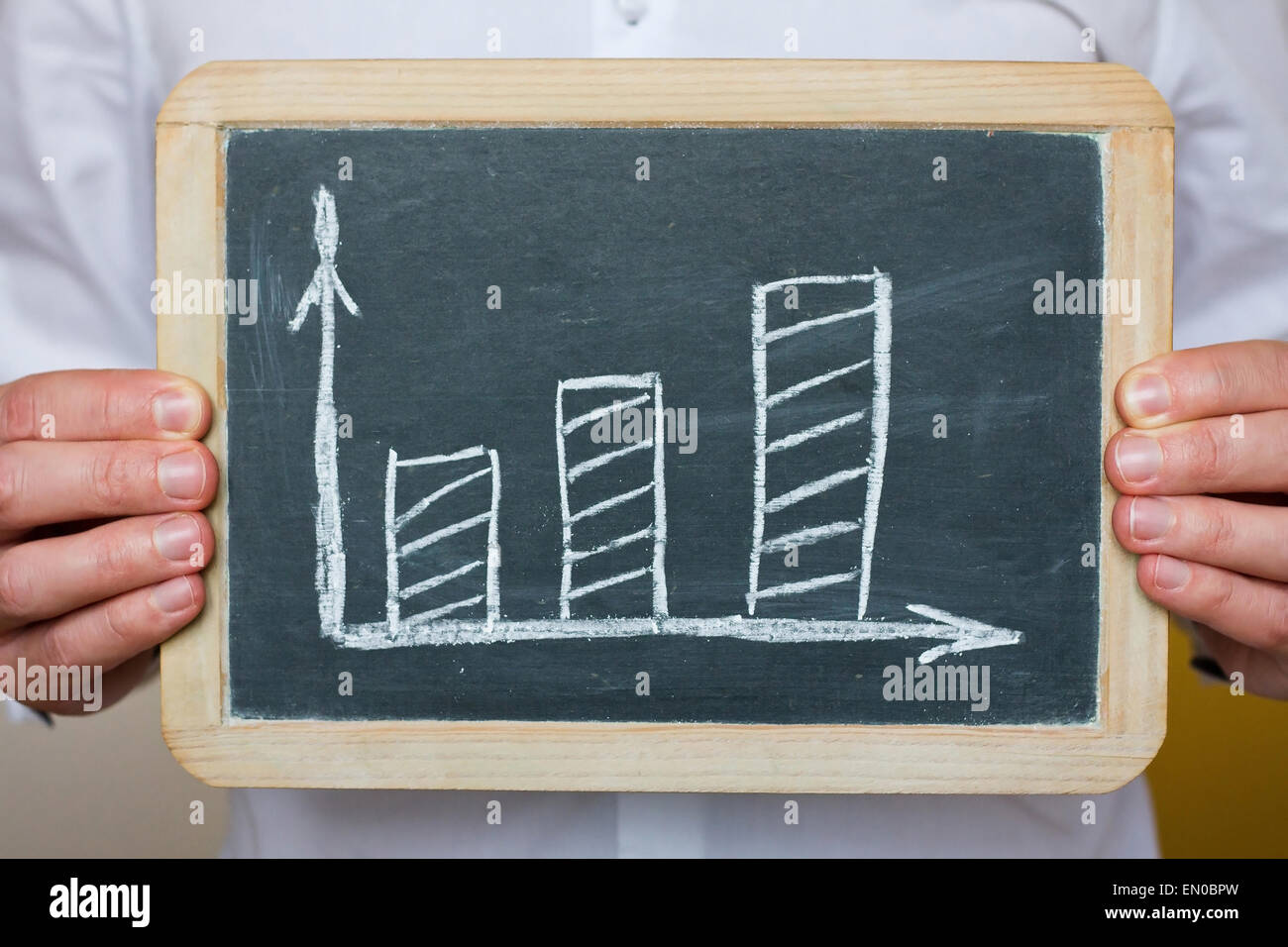 doctor hands showing chalkboard with chart Stock Photo