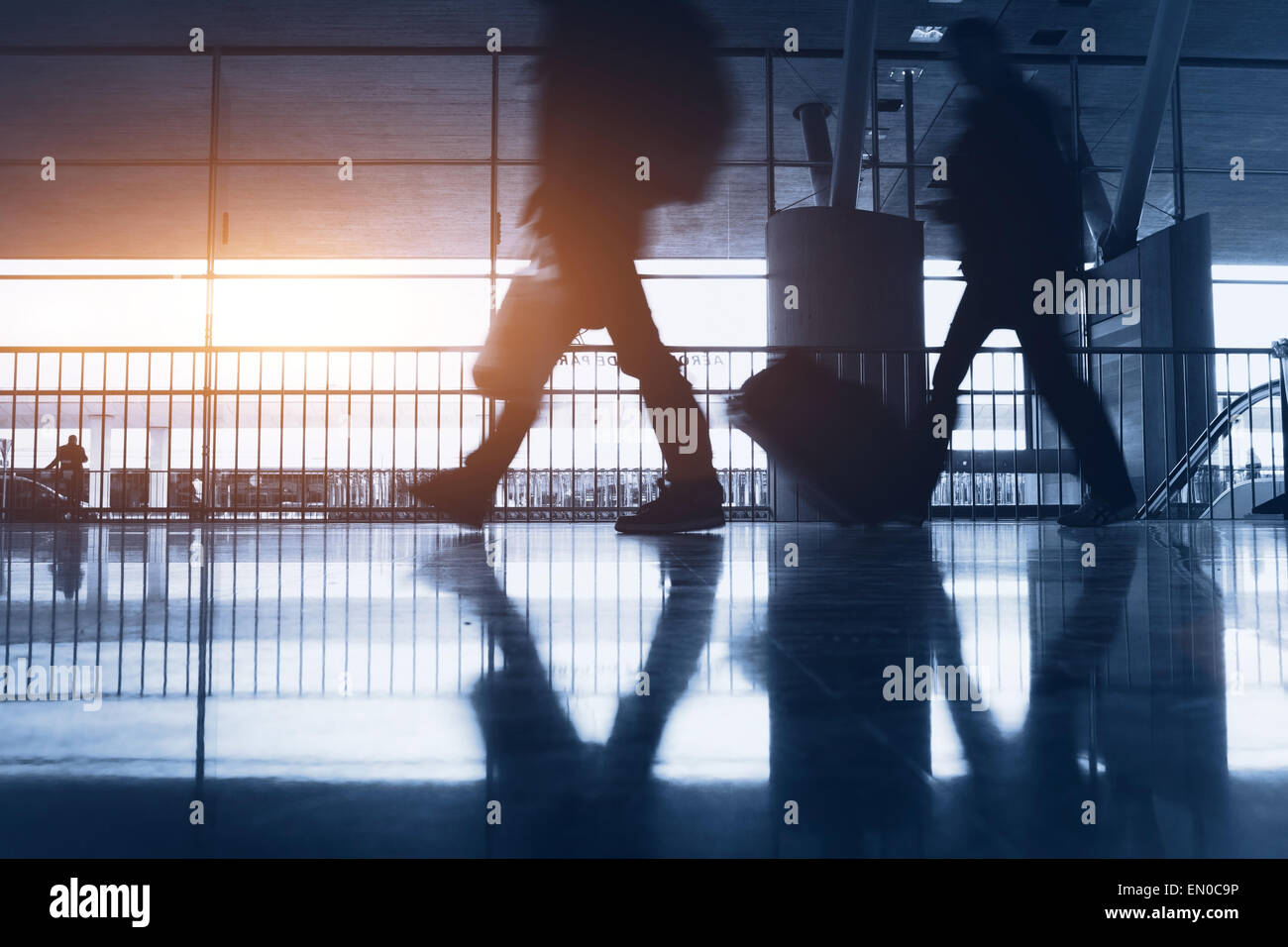 abstract airport background with walking commuters Stock Photo
