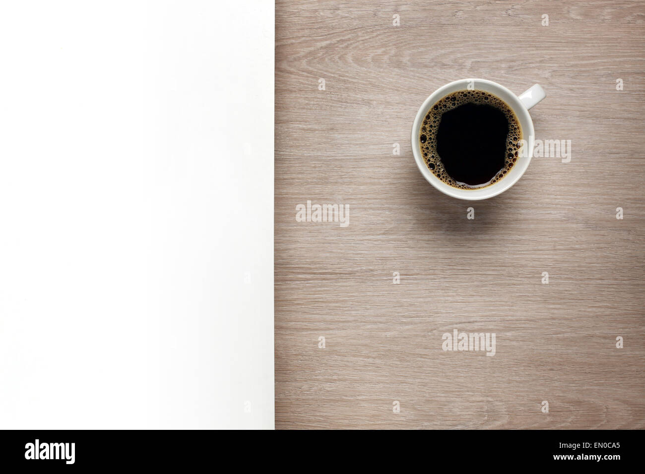 Cup of coffee on desk with white space Stock Photo