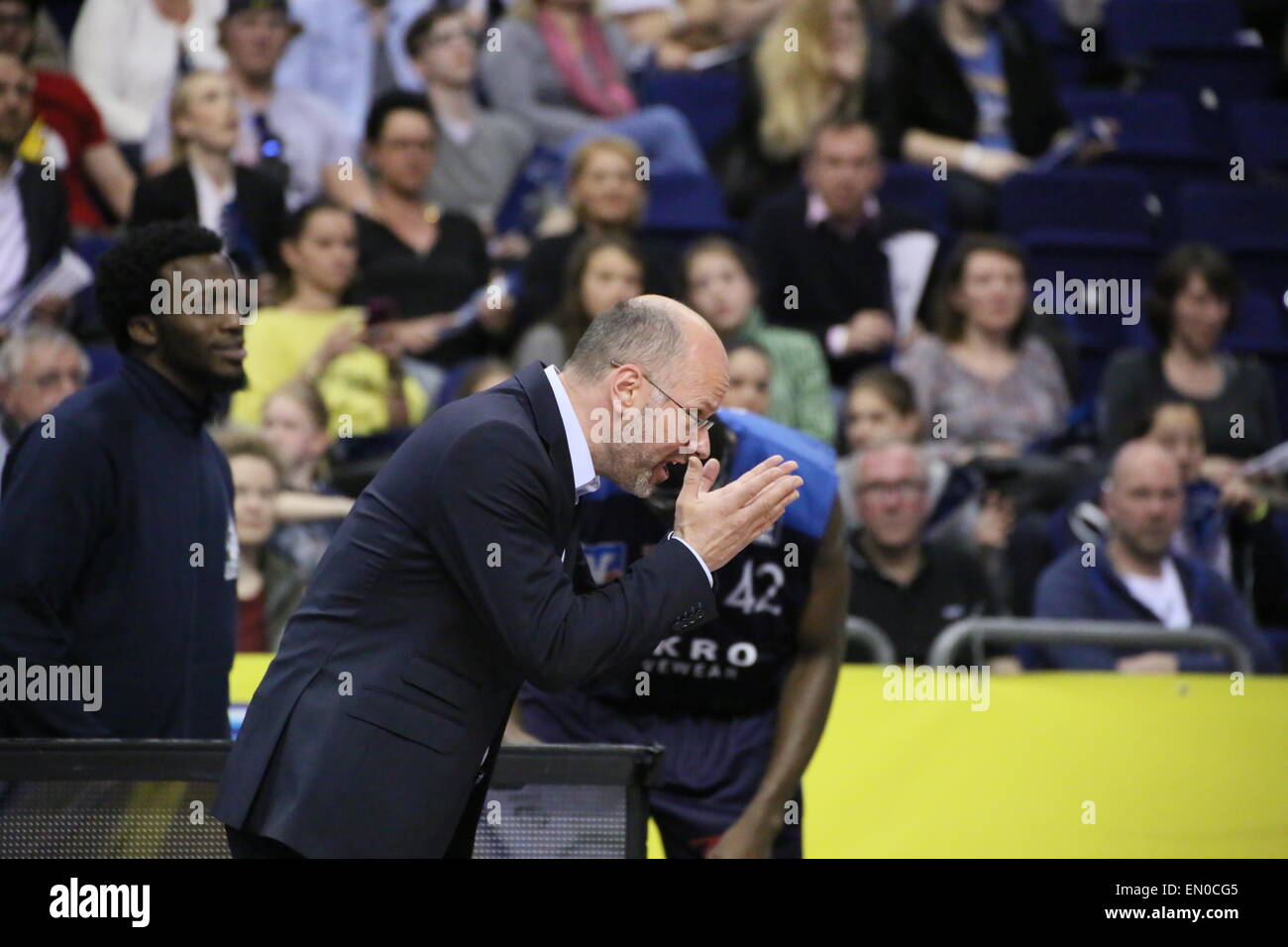 Berlin, Germany. 24th Apr, 2015. Ingo Enskat, head coach of Crailsheim Merlins instructs his players during BBL game Alba Berlin versus Crailsheim Merlins at O2 World. Credit:  Madeleine Lenz/Pacific Press/Alamy Live News Stock Photo