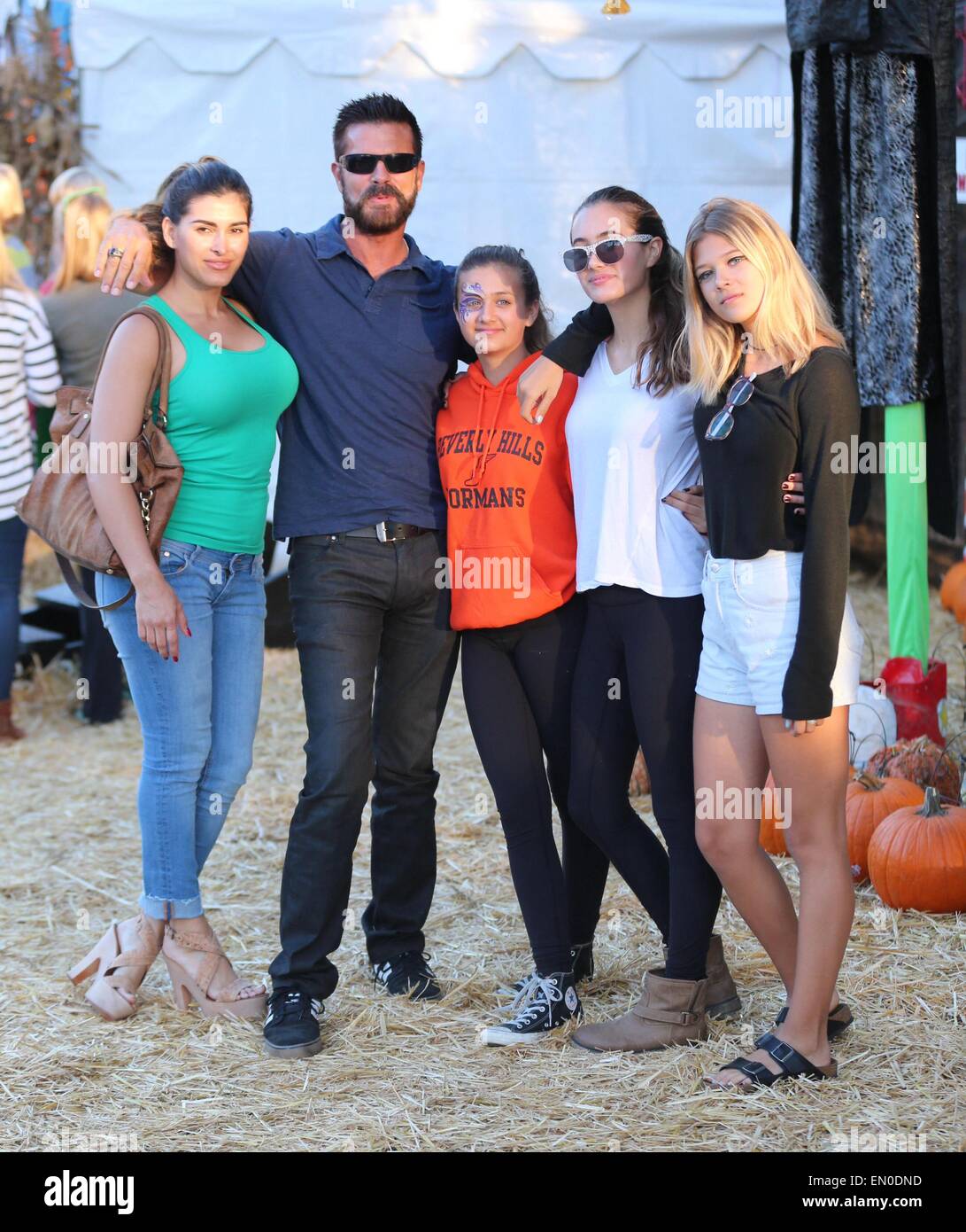 Lorenzo Lamas Arrives At Mr Bones Pumpkin Patch With His Family.