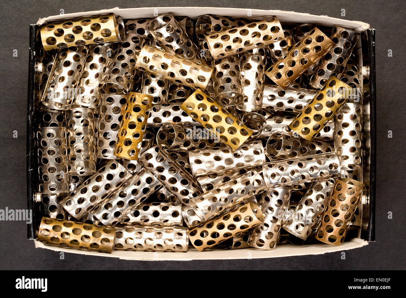 Closeup of Old Hair Rollers in a Box Stock Photo