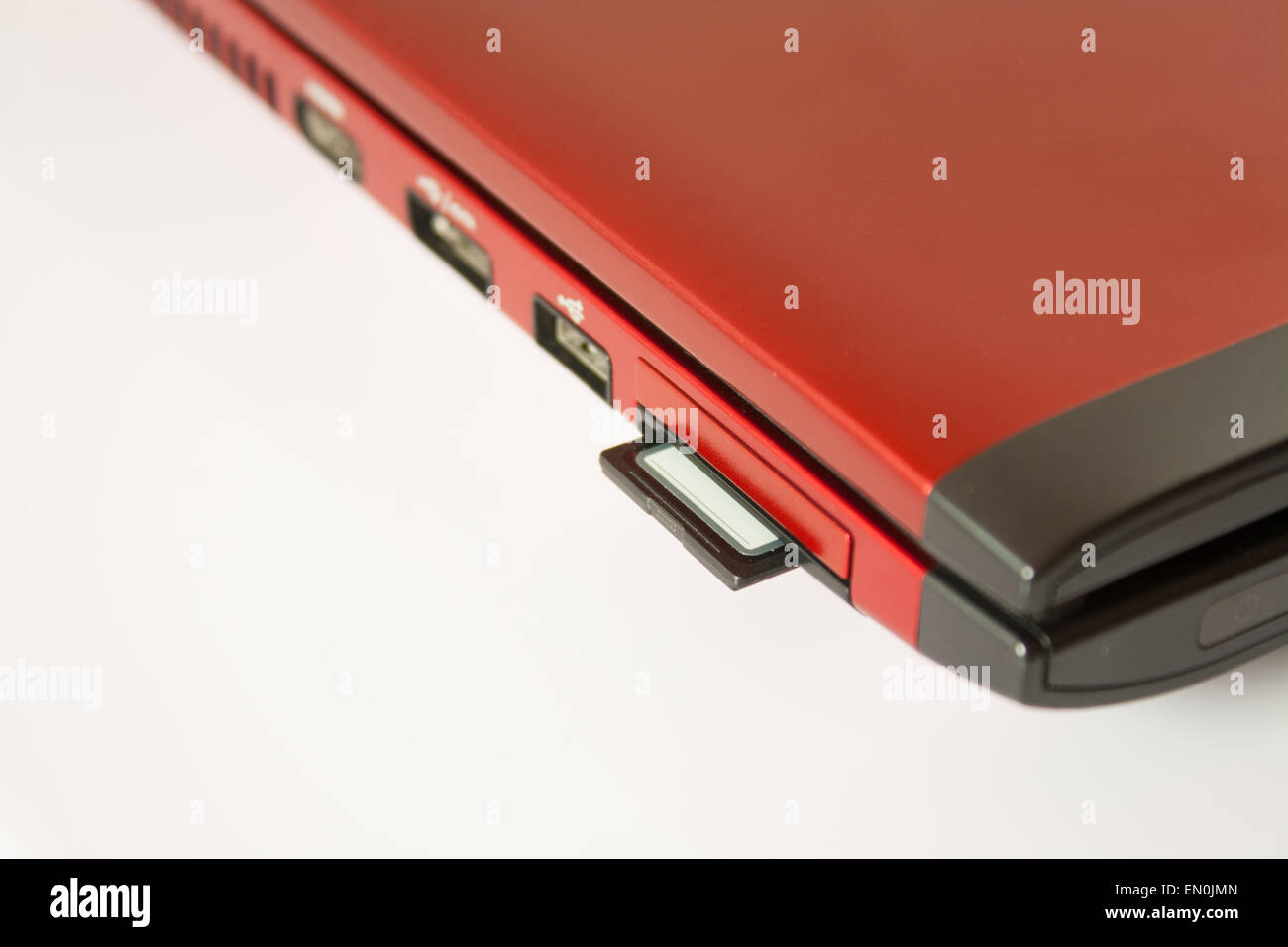 Plugging in SD Card into personal computer ready for photo file