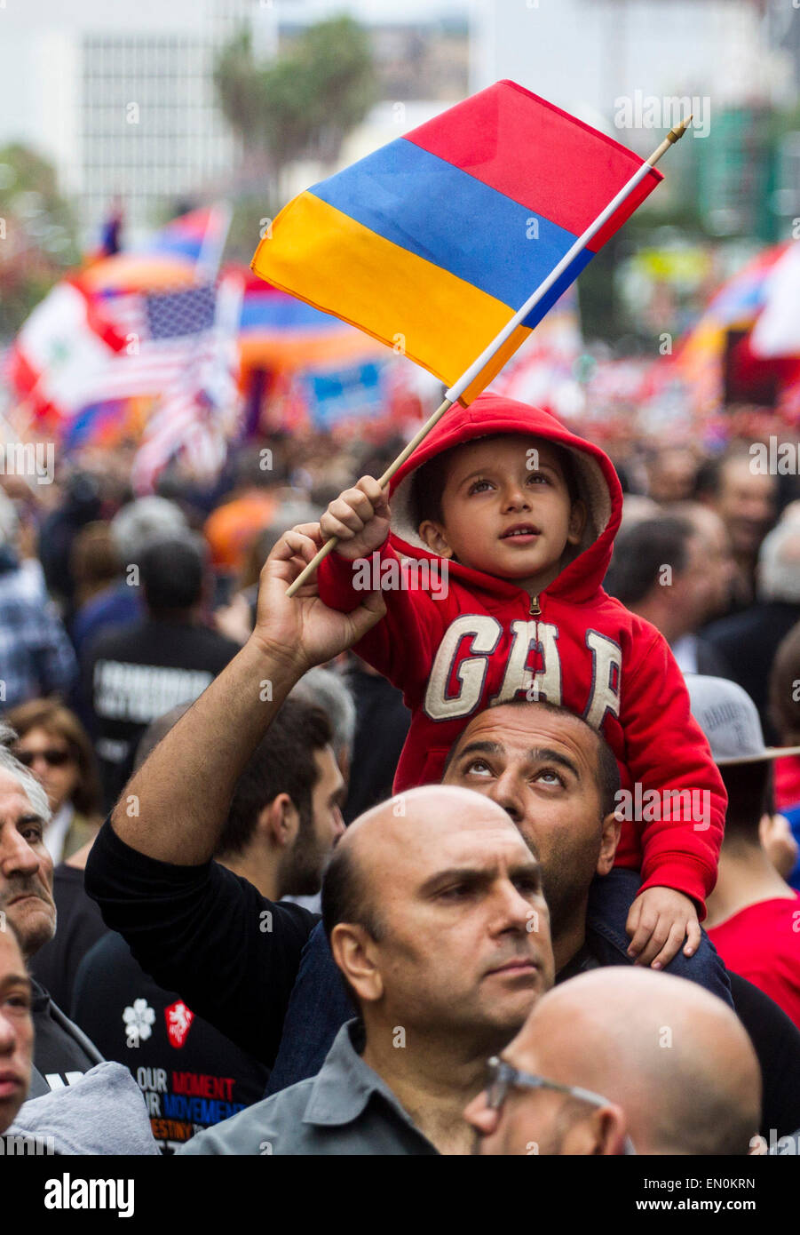 Los Angeles, USA. 24th Apr, 2015. A child waves an Armenian national flag during the rally marking the 100th anniversary of a genocide against the Armenians, in Los Angeles, the United States, on April 24, 2015. Demonstrators holding placards and national flags of Armenia marched to the consulate of Turkey in Los Angeles to mark the 100th anniversary of a genocide against the Armenians. Credit:  Zhao Hanrong/Xinhua/Alamy Live News Stock Photo