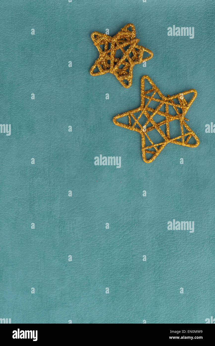 Golden Christmas stars on blue background Stock Photo - Alamy