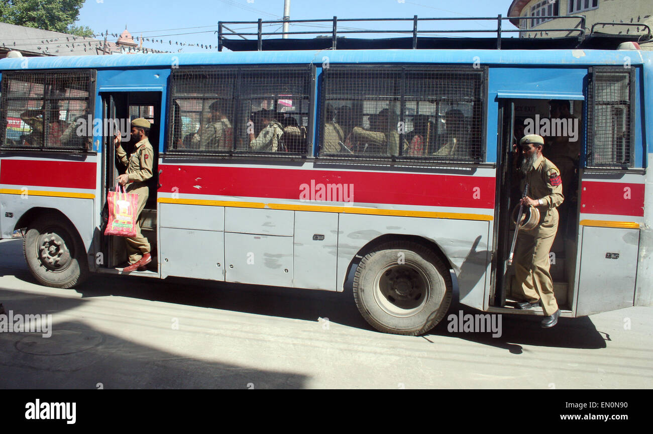 Srinagar, Indian Administered Kashmir: 25April . Indian policemen comeout from police bus for standby for law and order during Strike Separatist leaders in Kashmir have called a shutdown in the Valley to protest against the detention of hardliner Masarat Alam Bhat under the Public Safety Act (PSA), Masarat Alam, who was released from jail only last month, could be kept in detention for two years without any trial.Masarat Alam's police custody ends today His release by the new PDP-BJP government in Jammu and Kashmir had triggered a huge controversy. Credit:  sofi suhail/Alamy Live News Stock Photo