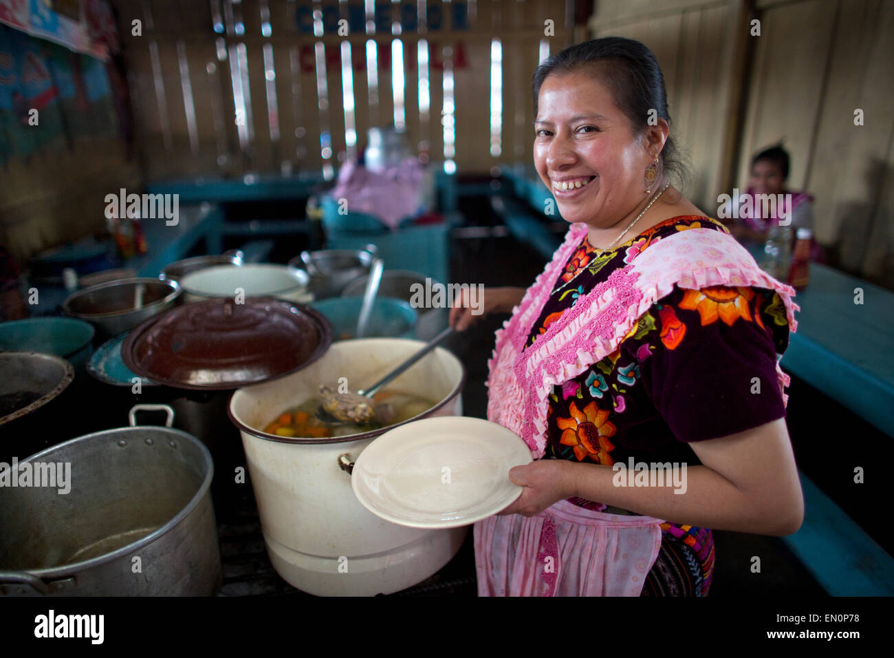 cook at work in Guatemala city market Stock Photo